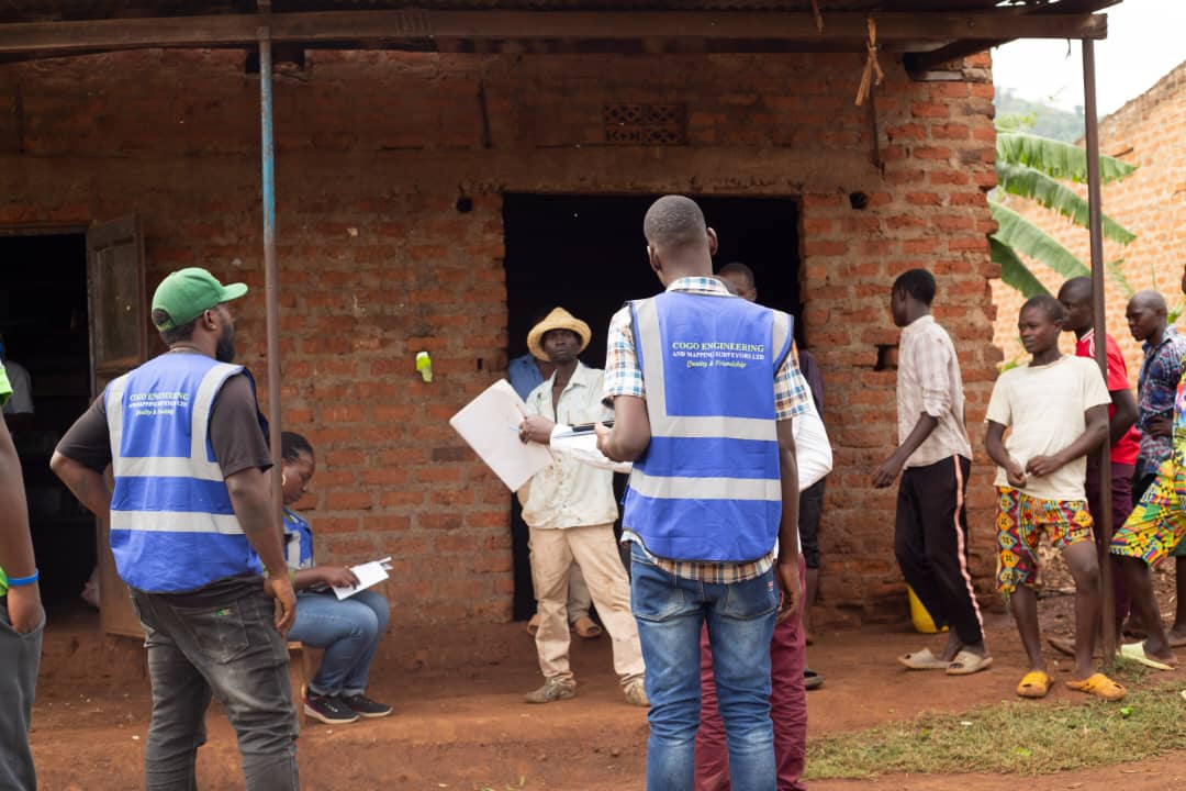 COGO surveyors engaging a rural household