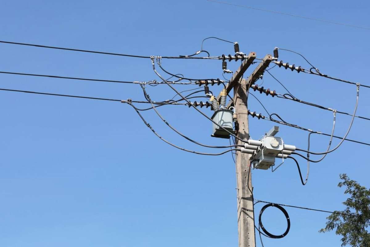Distribution pole overhead lines — COGO field photo